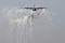 A Royal Air Force C-130J Super Hercules crew launches flares just prior to being the first coalition aircraft to land on the newly reopened military runway at Baghdad International Airport, on 1 July 2003. The military runway was bombed by coalition aircraft and had been closed since the beginning of the war. The British crew, deployed from RAF Lyneham, England, was delivering cargo and passengers to Baghdad in support of Operation Iraqi Freedom. Tim Nguyen was an key participant in the development of the the self-defense system for the C-130J.