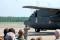 A 19th Aircraft Maintenance Squadron technician salutes the crew--and the aircraft--as C-130E 61-2358 taxies out for its last flight. This aircraft, the first C-130E to come of the then-Lockheed Georgia Company assembly line in 1961, closed out fifty-one years of service on 1 May 2012.