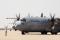 A 317th Airlift Group C-130J crew is marshalled out prior to a JPADS training mission at Dyess AFB, Texas. Dyess crews performed some of the first JPADS drops. With 39th and 40th Airlift Squadron crews dropping precision loads once or twice a month, the 317th AG has essentially become the JPADS training center.