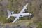 16 July 2010: The Royal Norwegian Air Force brought two of its C-130Js to the Combined Strength 2010 exercise. This aircraft, nicknamed Idunn is shown here maneuvering around the hills in central Scotland.