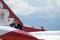 SSgt. Kyle Balajadia, Thunderbird 7 assistant dedicated crew chief, wipes down his F-16 after a practice show at Peterson AFB in Colorado Springs, Colorado, in May 2014.