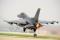 An F-16 Fighting Falcon pilot takes off during exercise Beverly Midnight 14-2 at Kunsan AB, Republic of Korea, on 16 July 2014. The Operational Readiness Exercise assesses mission capabilities and ensures the Wolf Pack is in a constant state of readiness.