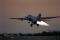 F111 taking off at sunset on a training mission from Royal Australian Air Force Base Amberley. The RAAF is in the process of transitioning from the F-111 to the F-35 Lightning II.