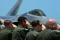 U.S. Air Force Airmen from the 1st Fighter Wing salute Brig. Gen. Kevin Huyck, 1st FW commander, as he completes his fini flight at JB Langley-Eustis AFB, Virginia, on 7 July 2015.